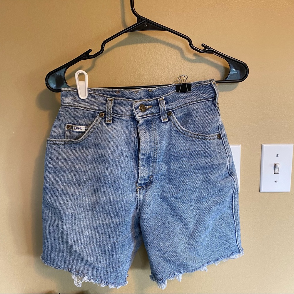 Lee’s light blue Jean shorts with distressed hem